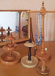 Photograph of turned wooden jewellery stands