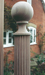 Photograph of detail at the top of a turned column
