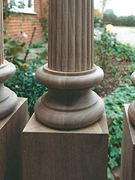 Photograph of detail at the base of a turned column
