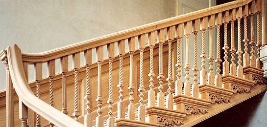 Photograph of a staircase using turned handrail spindles