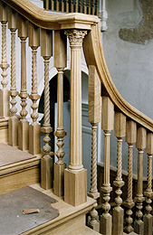 Photograph of turned stair handrail spindles